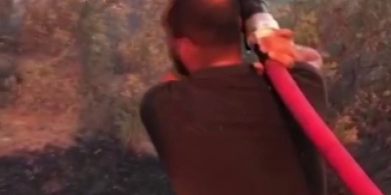 Adana'dan Antalya'ya tatile gittiler, itfaiyenin hortumunu alıp yangına müdahale ettiler