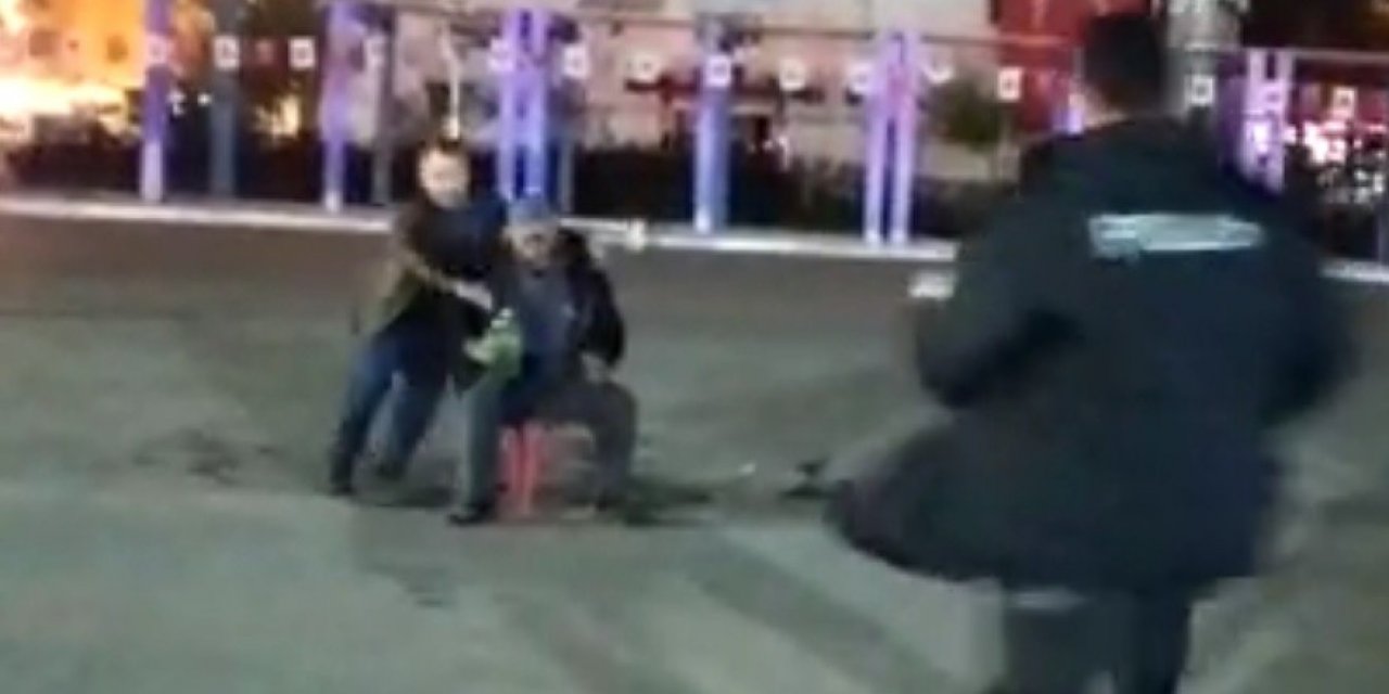 Canını hiçe sayan polis memuru kendisini benzinle yakmak isteyen şahsın üzerine atladı