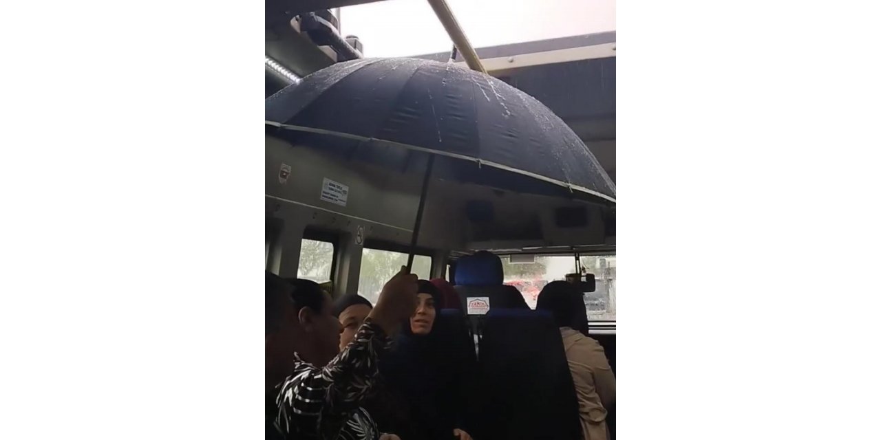 Dolmuşta şemsiyeli yolculuk