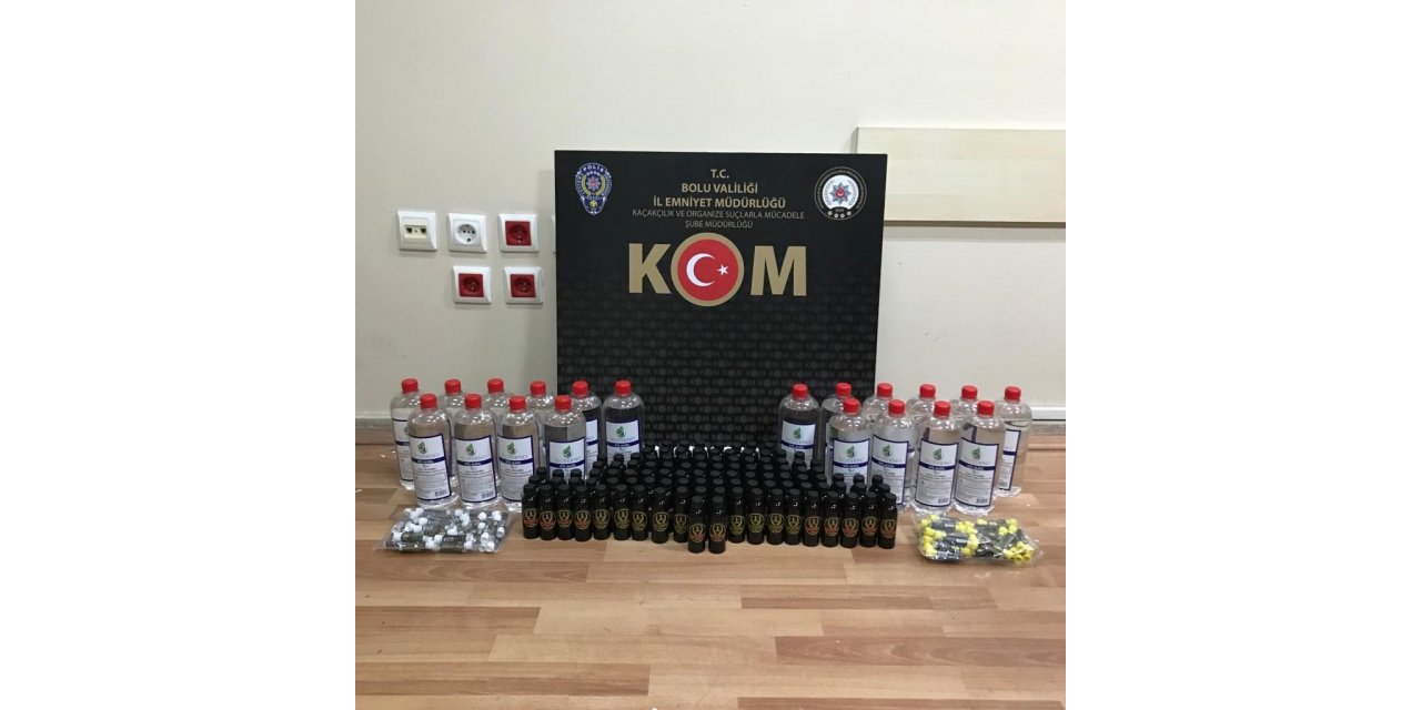 Aracında sahte içki yapımında kullanılan malzeme taşıyan şüpheliye yılbaşı sürprizi