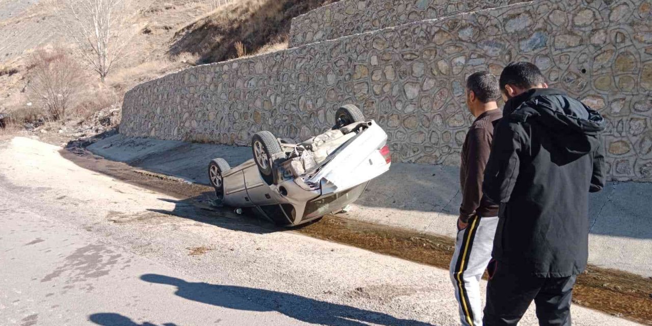 Takla atan otomobilden burnu bile kanamadan kurtuldu