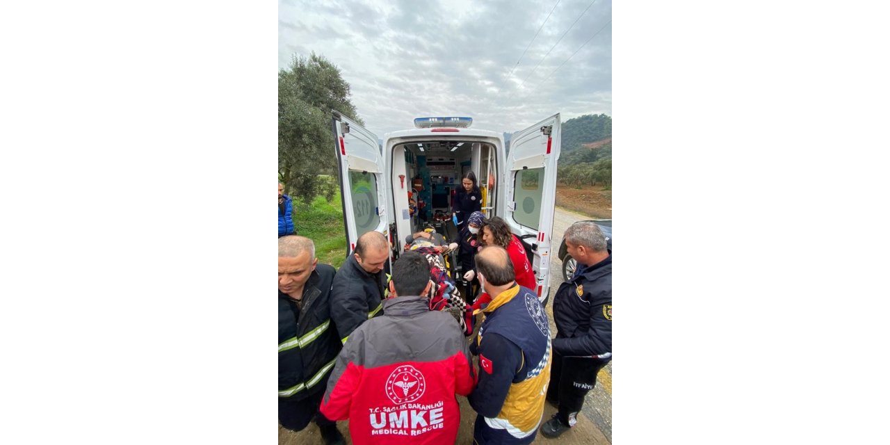 Ters dönen paletli iş makinesinde sıkışan sürücü yaralandı