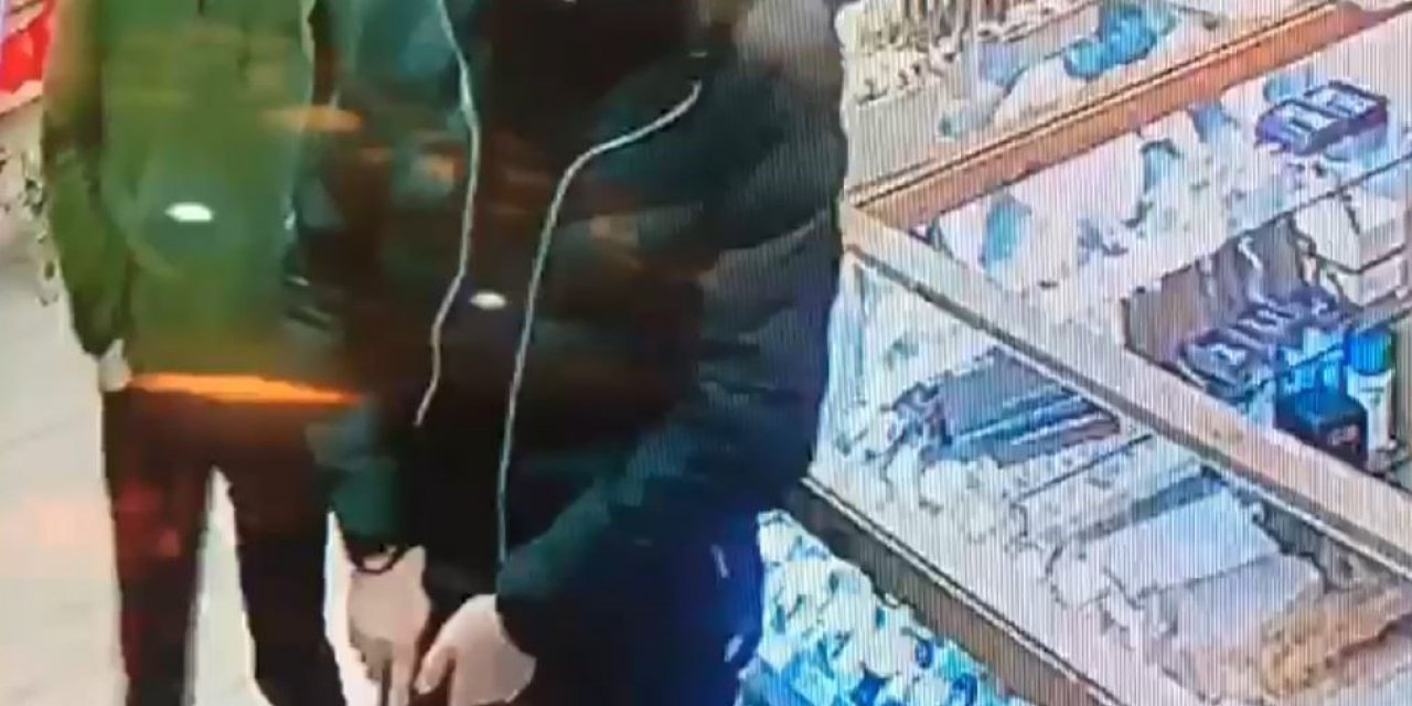 Kendilerini polis olarak tanıtan soyguncular dükkandan 7 bin ve 500 doları çaldı