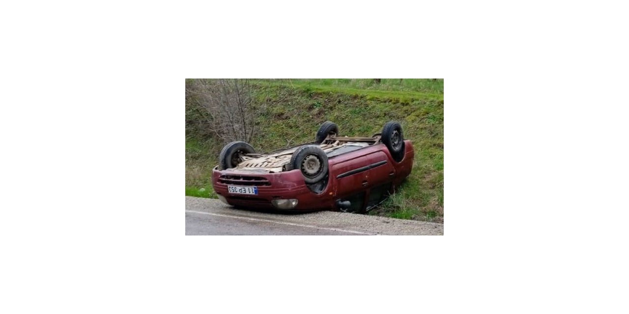 Takla atan otomobilden yara almadan kurtuldu