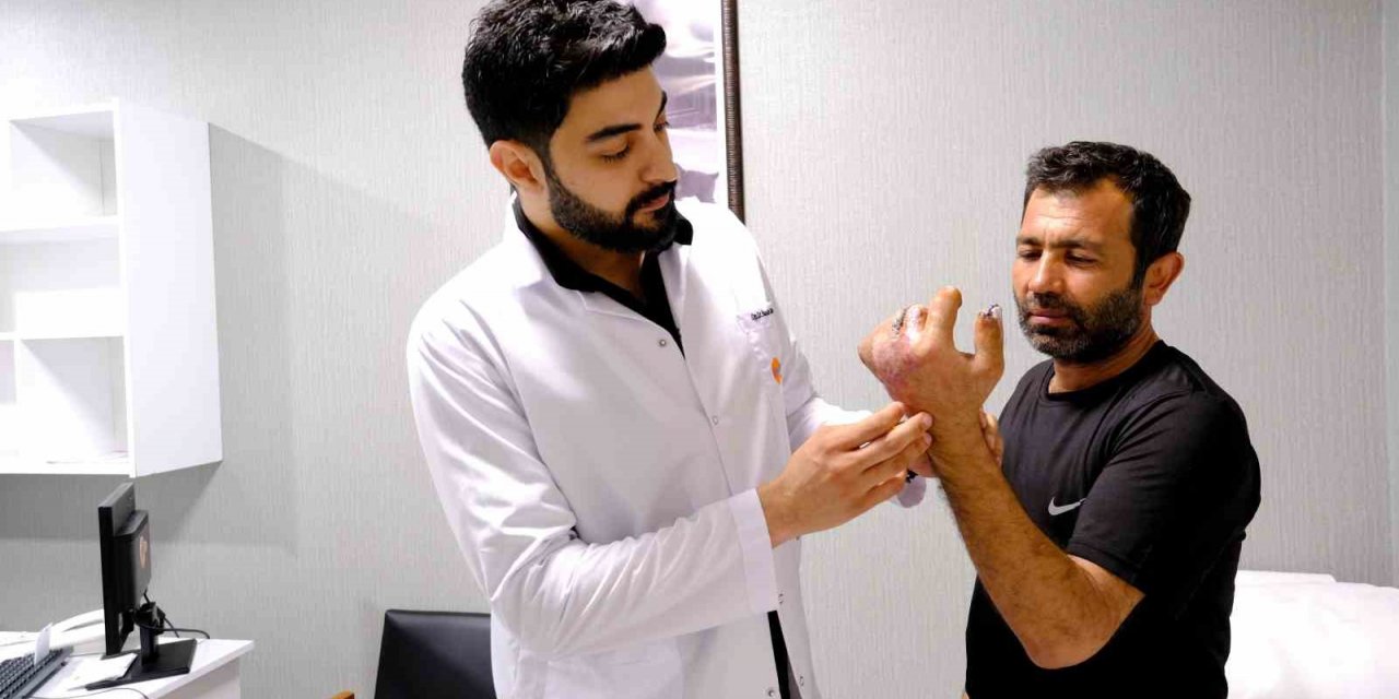 Makinada parçalanan eli karnına dikilerek kesilmekten kurtarıldı