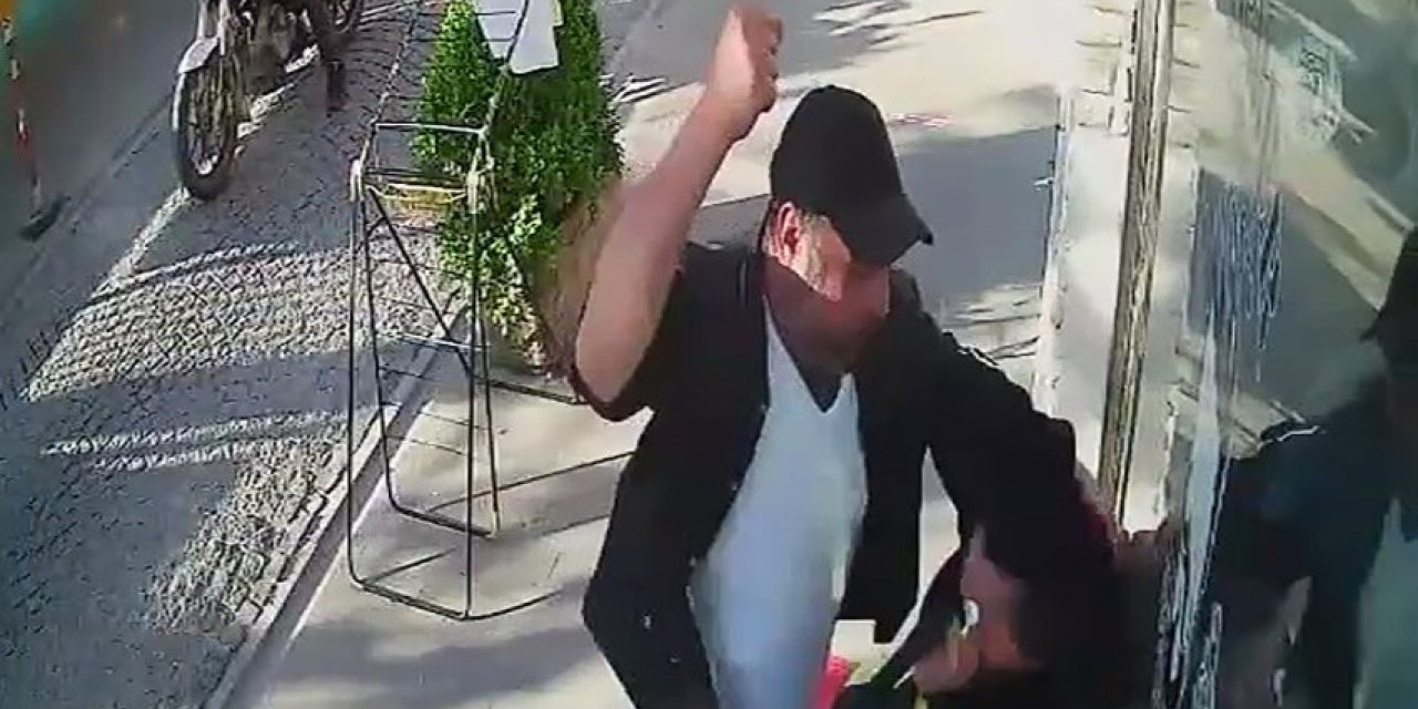 Tartıştığı kadını sokak ortasında darp etti