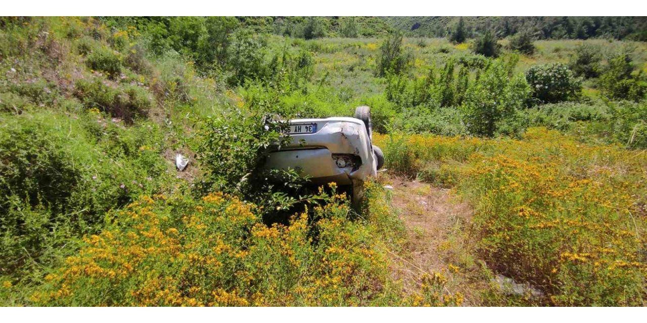 Takla atan otomobilden burnu bile kanamadan kurtuldu