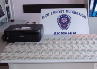 Renkli fotokopiyle sahte para bastı