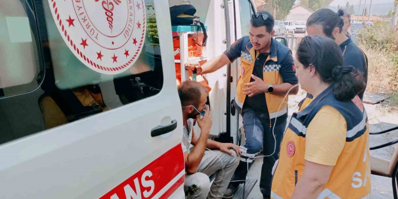 Tekstil atölyesinde çıkan yangında bir itfaiye eri dumandan etkilendi