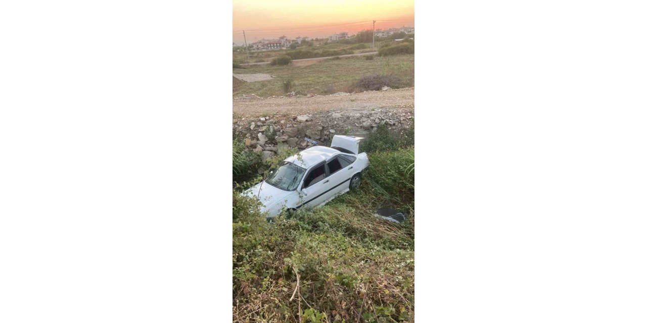 Sürücü belgesi olmadan kullandığı otomobille kanala uçtu