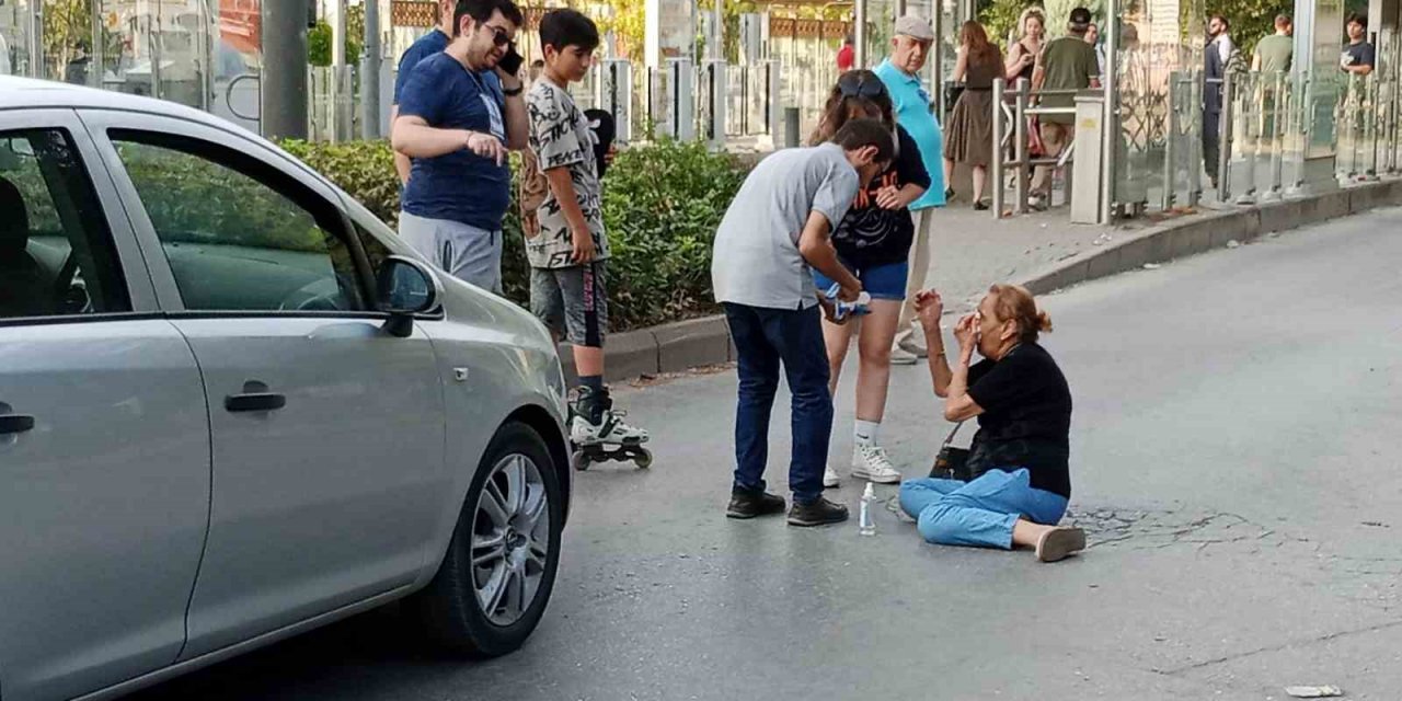 Yolun karşısına geçmeye çalışan kadına otomobil çarptı