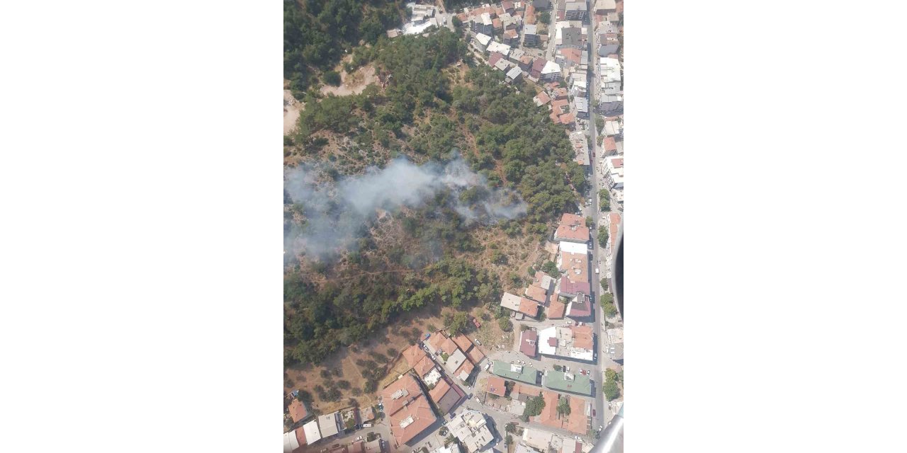 Yerleşim merkezine yakın alanda çıkan orman yangını söndürüldü