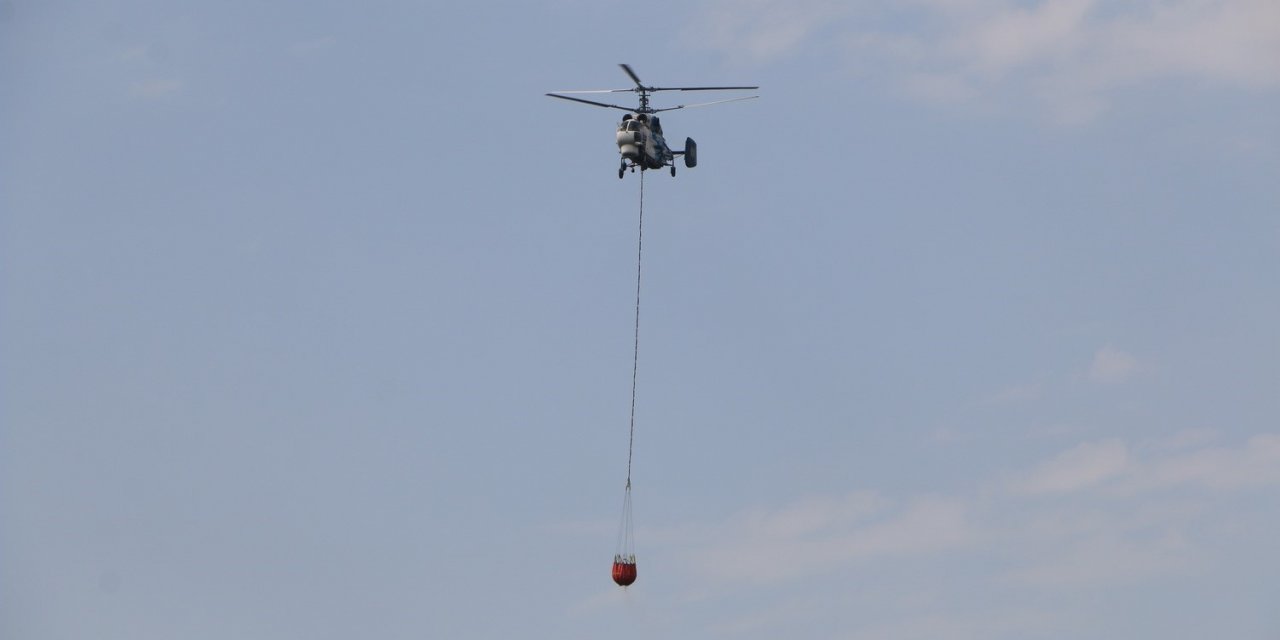 Dün yangının çıktığı ormanda soğutma çalışmaları yapılıyor