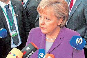 Merkel Rumlar'a sahip çıktı