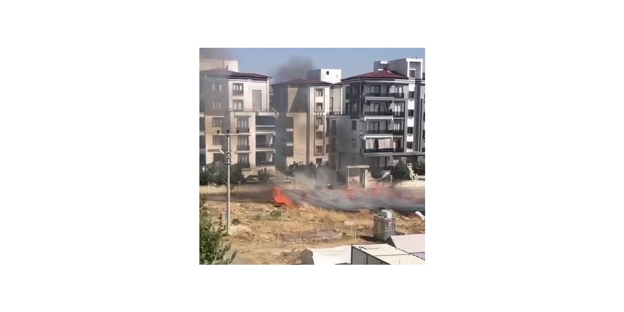 Otluk alanda çıkan yangın çadır ve konteynerlere sıçramadan söndürüldü