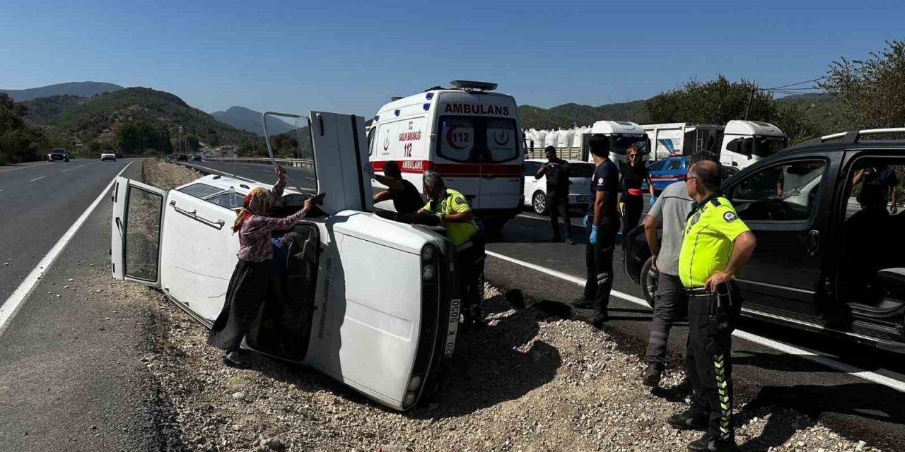 Yan yatan otomobilden yara almadan kurtuldular