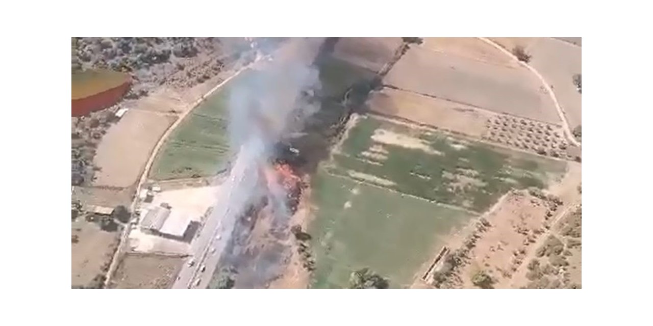 Milas’ta yol kenarındaki otluk arazide çıkan yangın söndürüldü