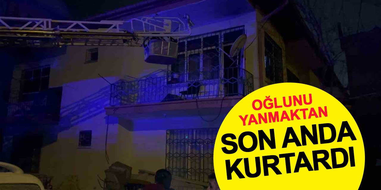 Oğlunu yanmaktan son anda kurtardı