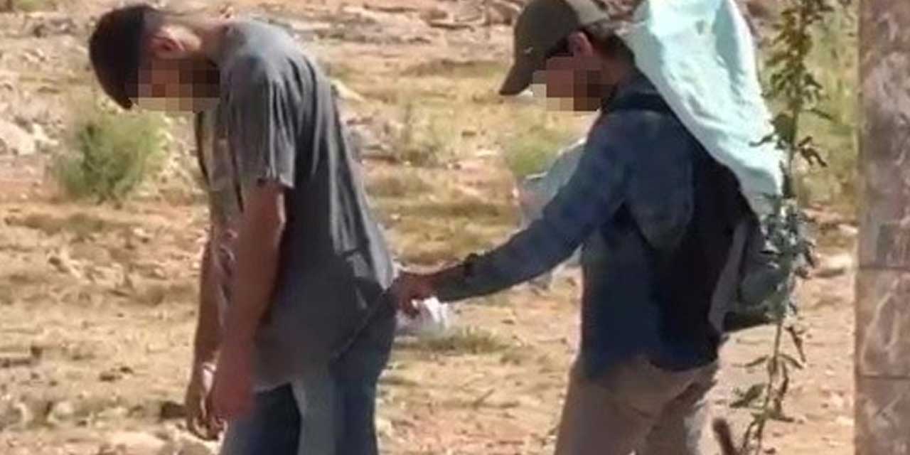 Biri ayakta uyudu, diğeri cebinden telefonunu çaldı: O anlar kamerada