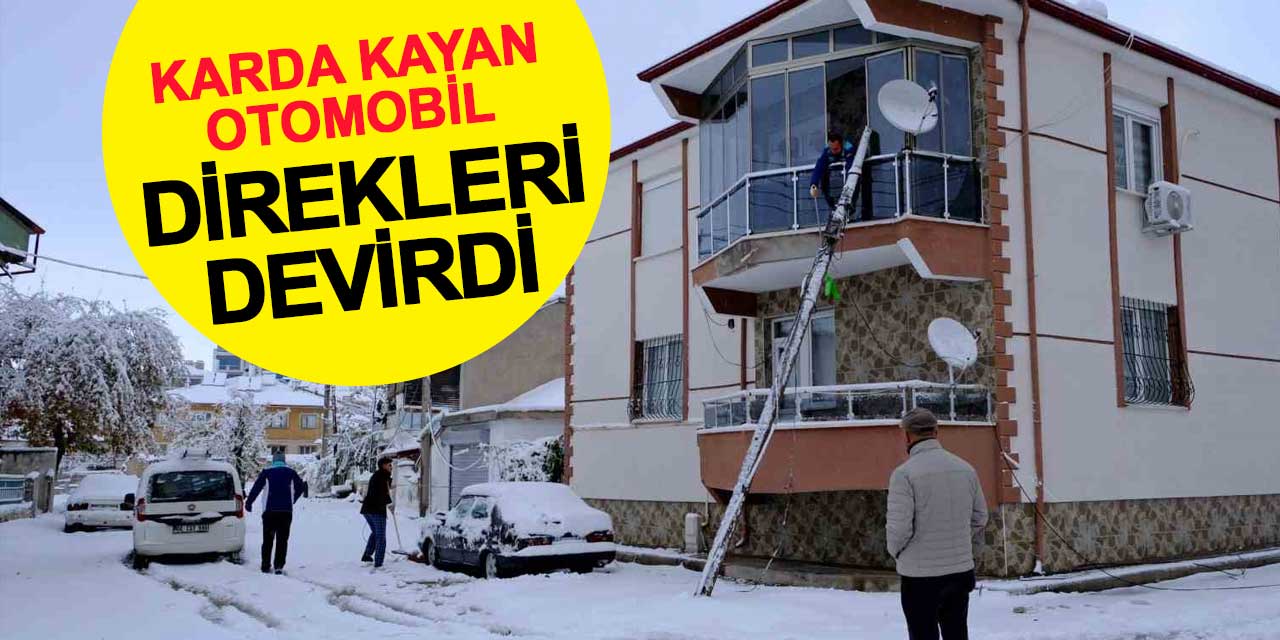 Karda kayan otomobil 2 telefon direğini devirdi