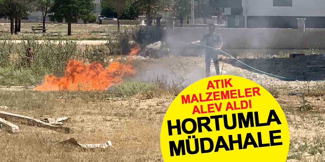 Atık malzemeler alev aldı, vatandaş hortumla müdahale etti