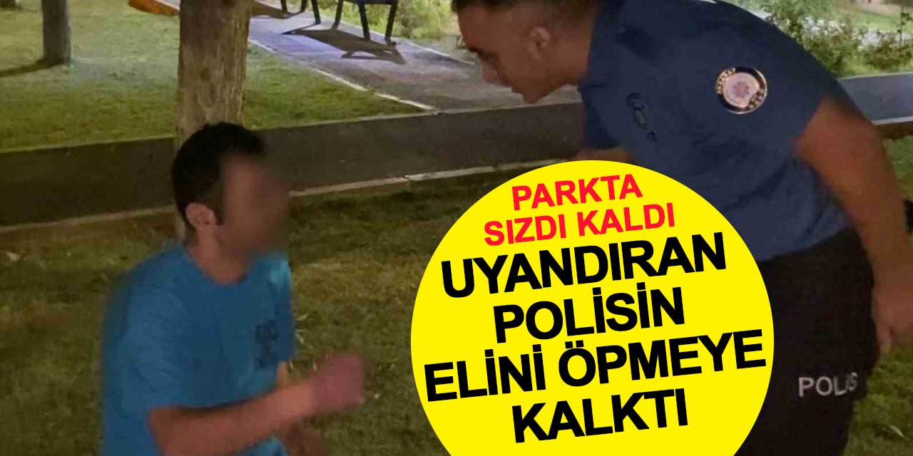 Parkta sızdı kaldı, uyandıran polisin elini öpmeye kalktı