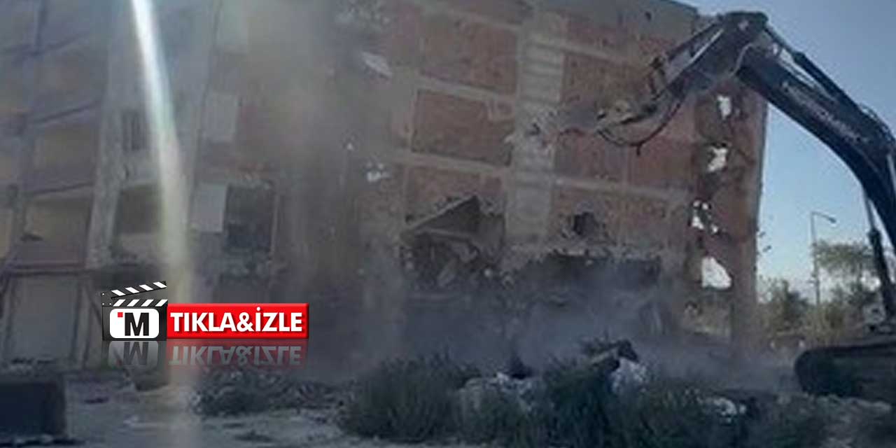 Yıkılan binanın altında kalmaktan saniyelerle kurtuldu