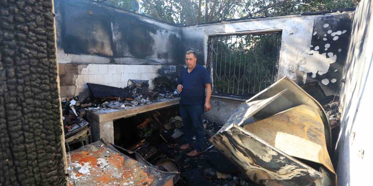 Evinin yanışını televizyon izler gibi izledi