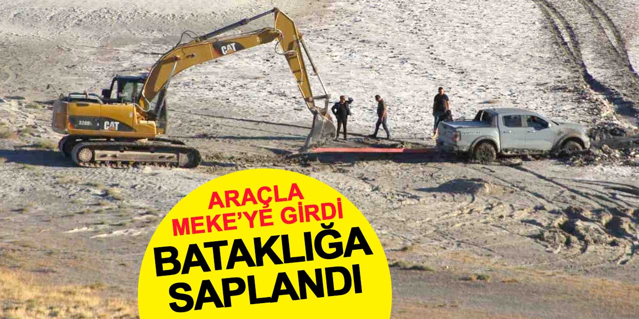 Araçla Meke Gölü'ne girdi, bataklığa saplandı