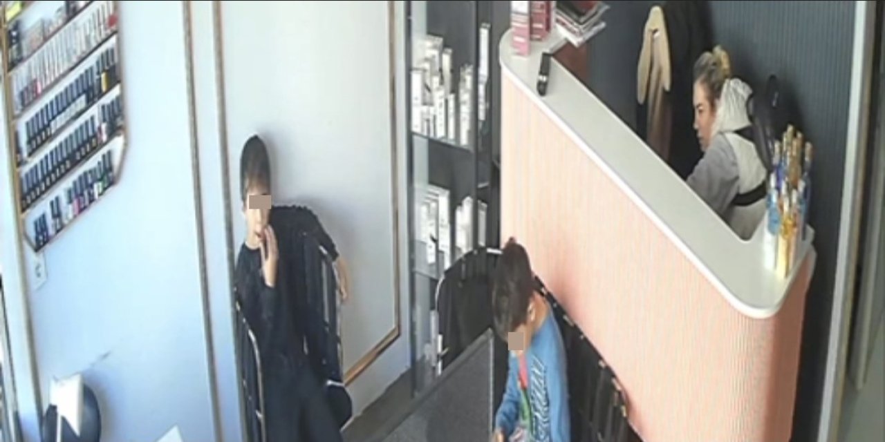 Hırsızlık yapan kadın kendisini uyaran çocukları itip kaçtı