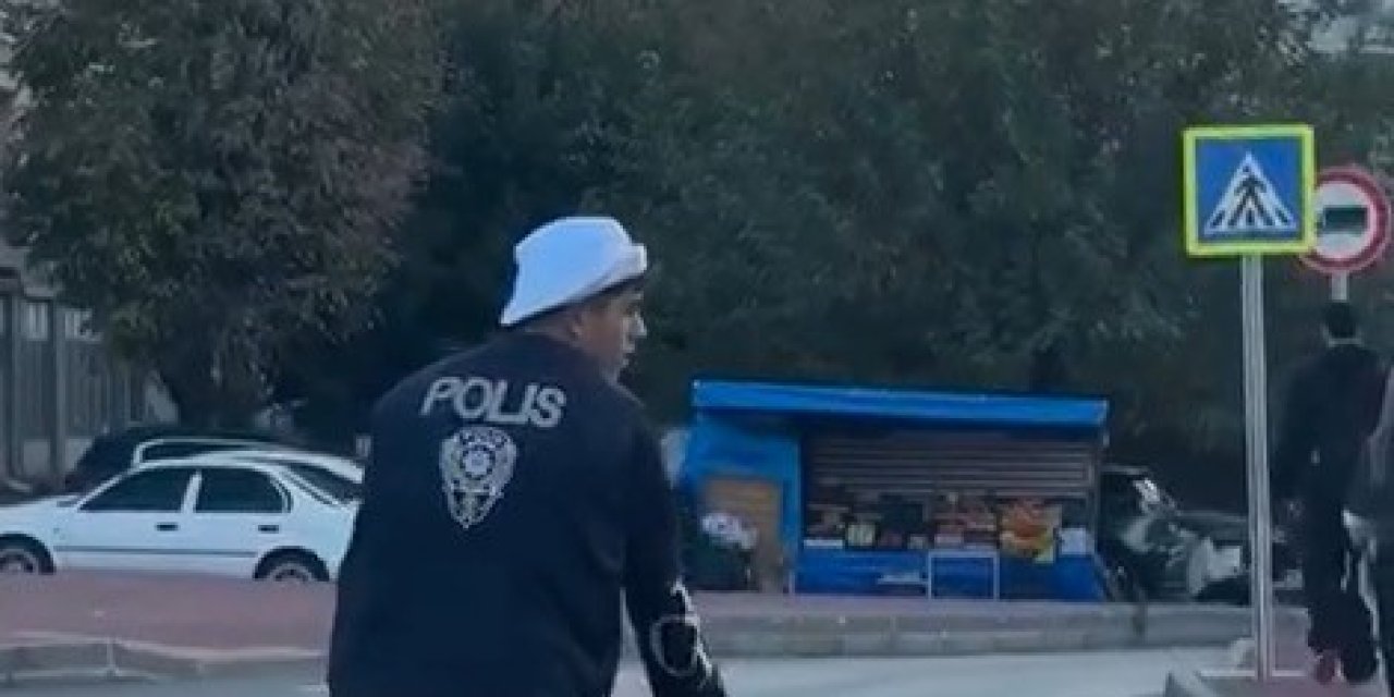 Polis yeleği giyip akrobasi yaptı