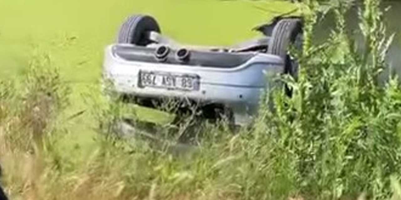Su dolu drenaj kuyusuna gömülü otomobilden 2 ceset çıktı
