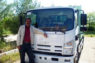 Gündüz Belediyesi'ne çöp kamyonu hibe edildi