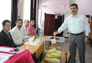 Doğan: Demokrasi bayramı olsun