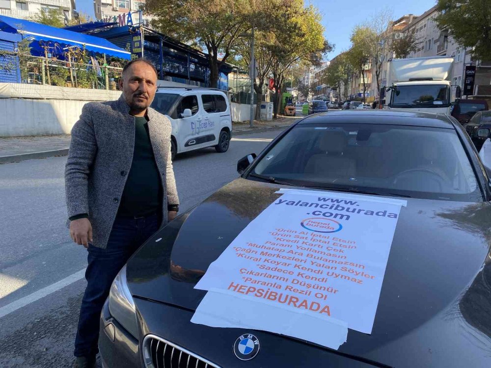 'Hepsiburada mağdur etti' diye tepki gösteren esnaf bastırdığı afişi arabasına astı