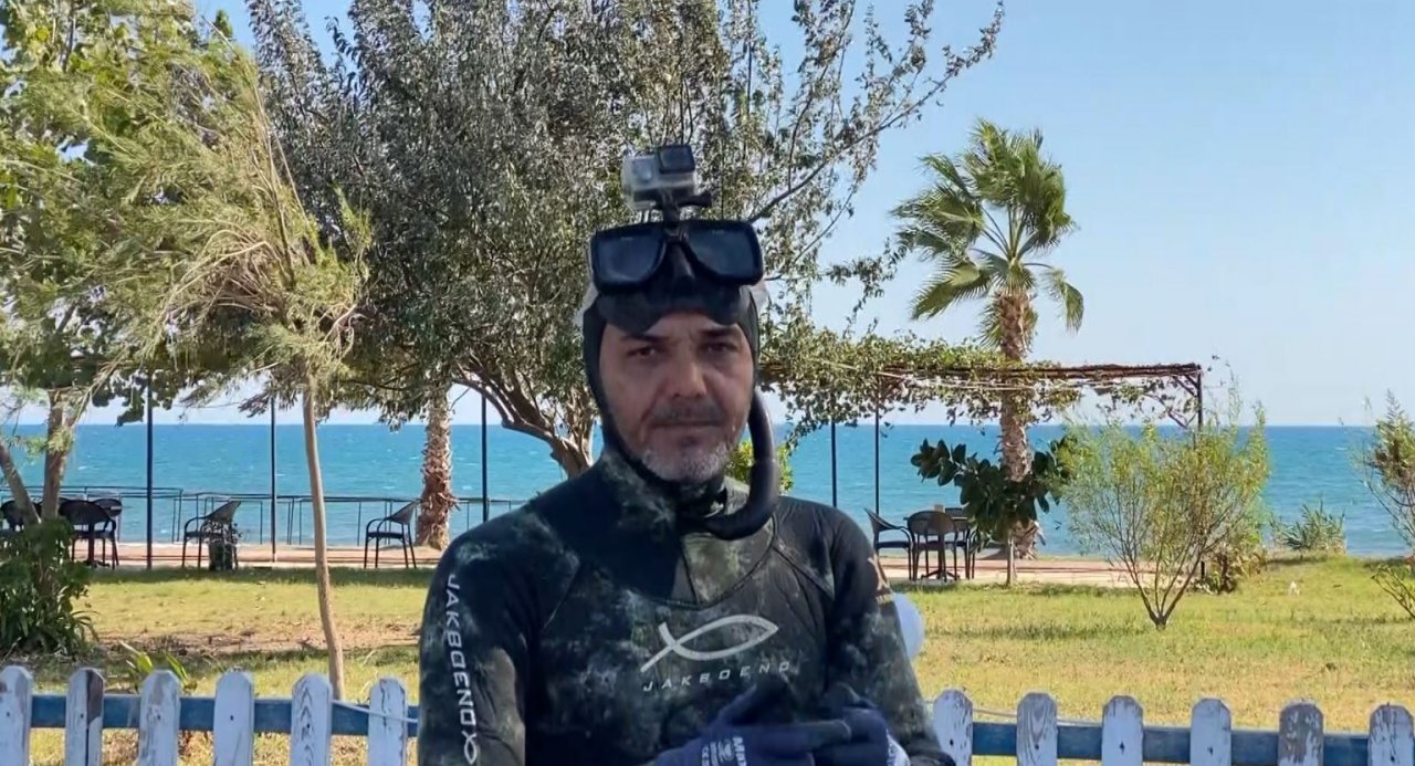 Zıpkınla avlanırken bulduğu küp Sahil G"üvenlik ekipleri gözetiminde çıkartıldı