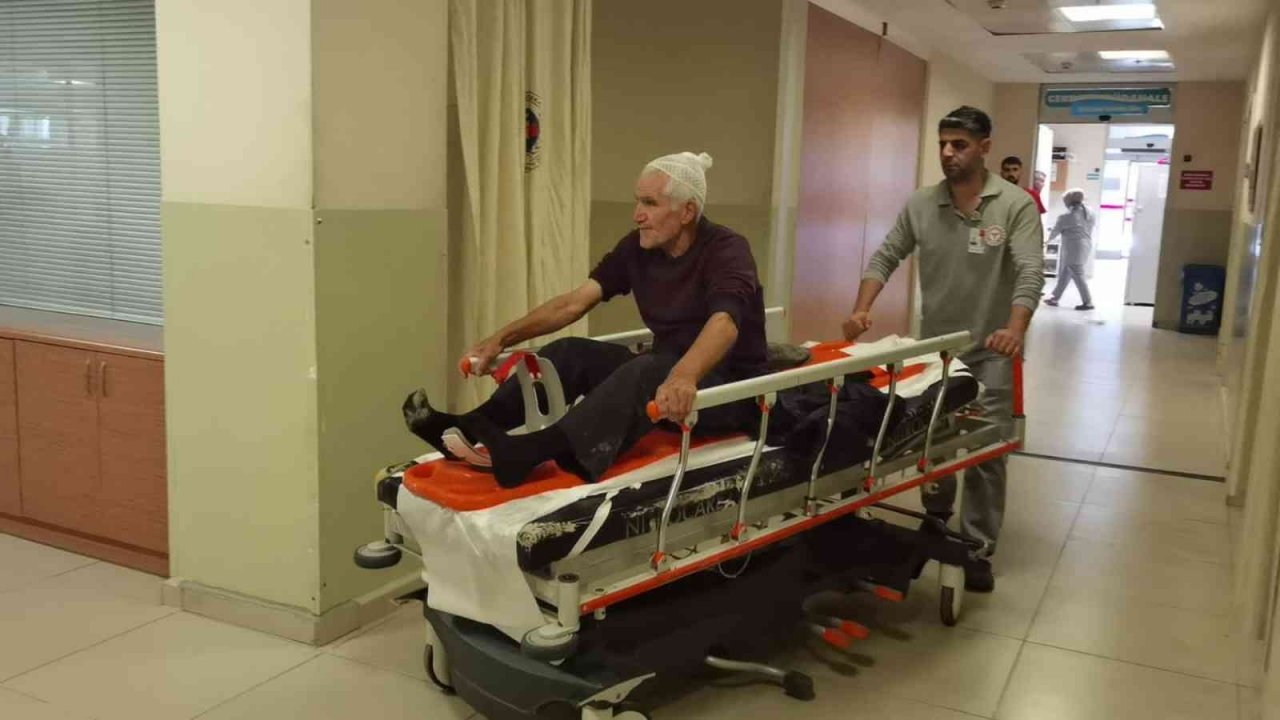 Bisiklete çarpan cip askıda kaldı