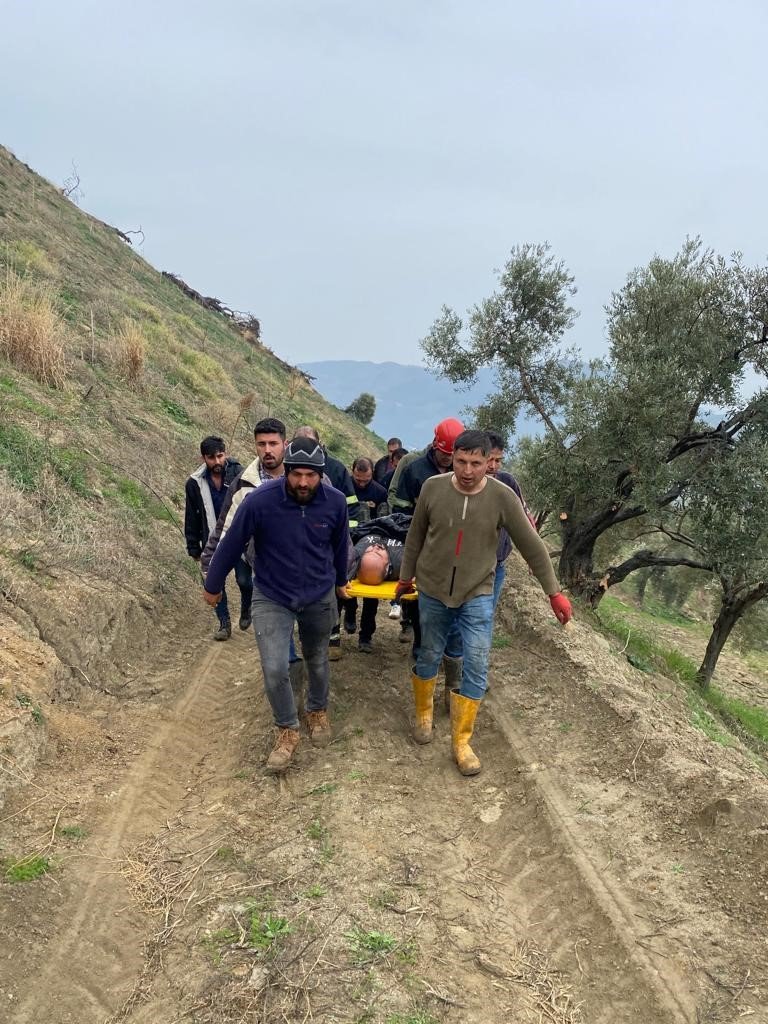Ters dönen paletli iş makinesinde sıkışan sürücü yaralandı