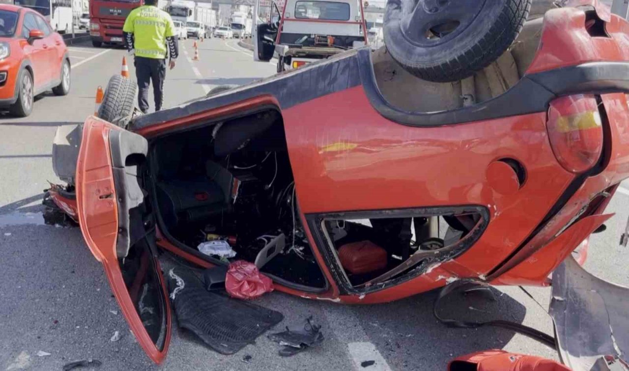 Takla atan otomobilden burnu bile kanamadan kurtuldu