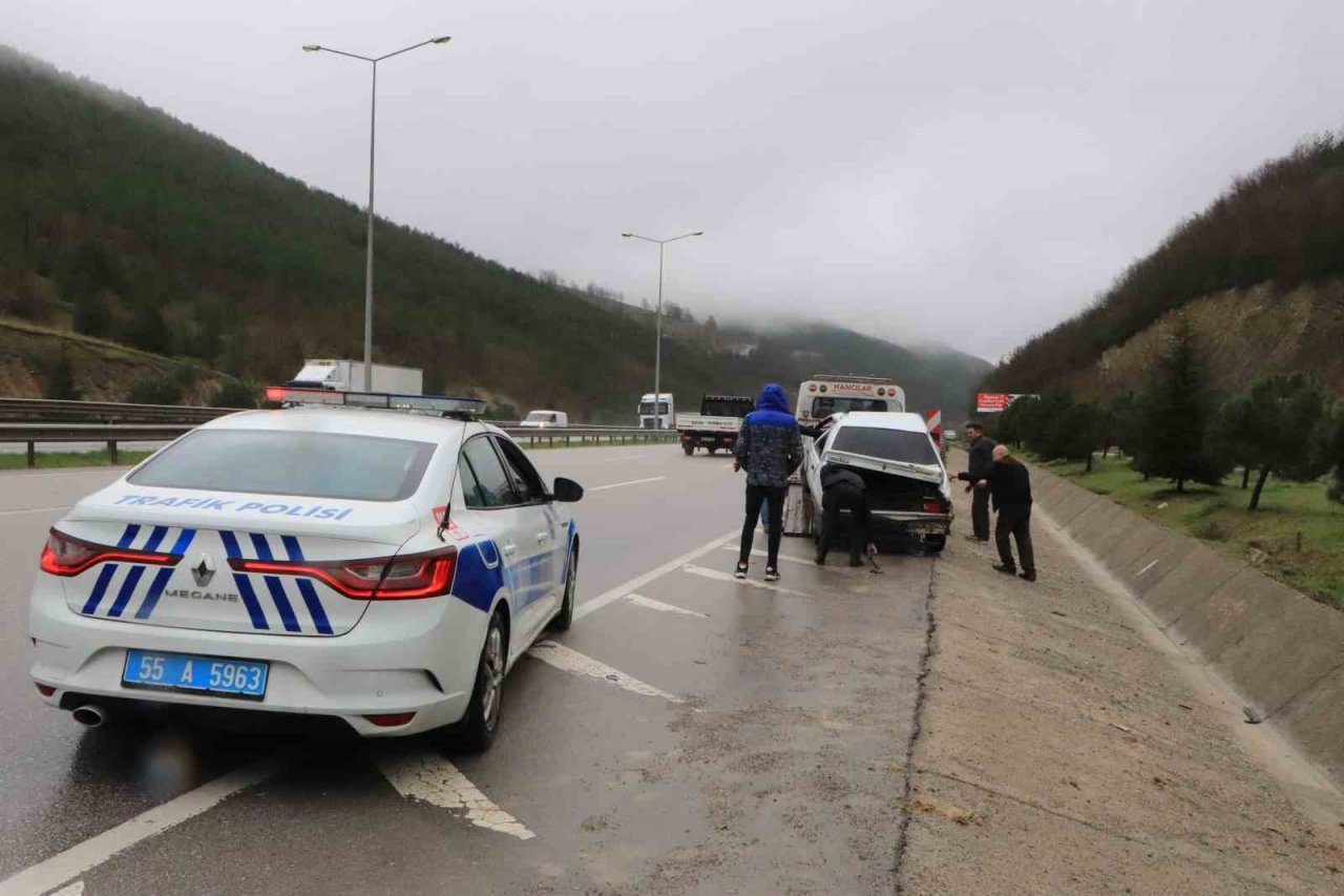 Takla atan otomobilden burnu bile kanamadan kurtuldu