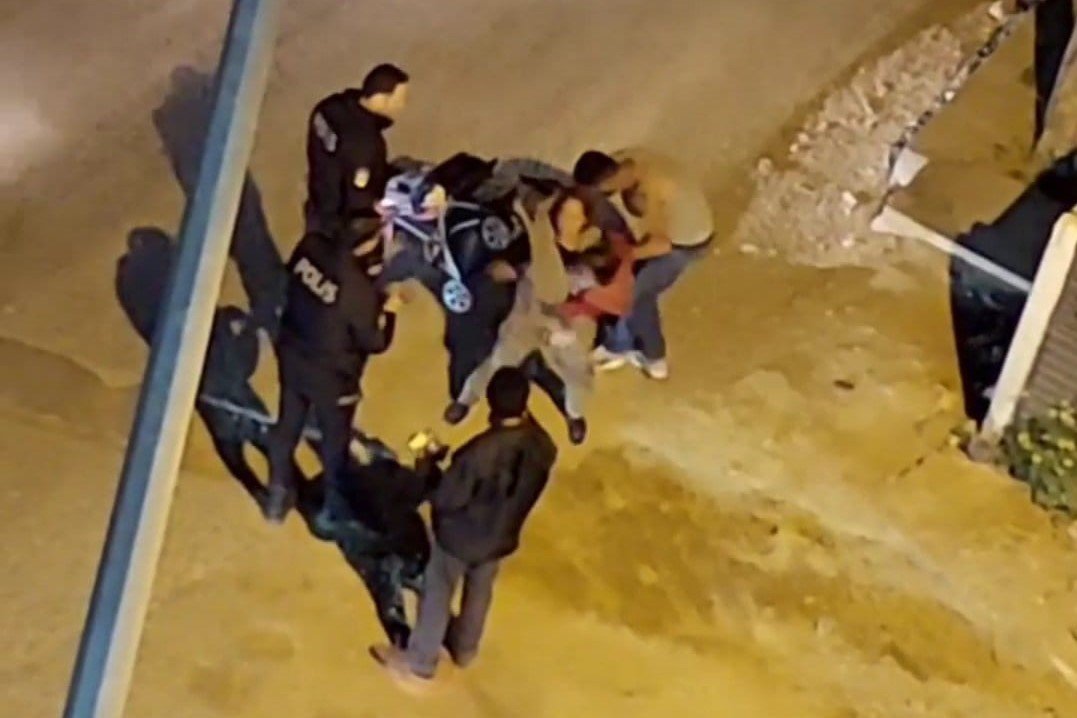 Dayak yediği kocasını polise vermemek için direndi