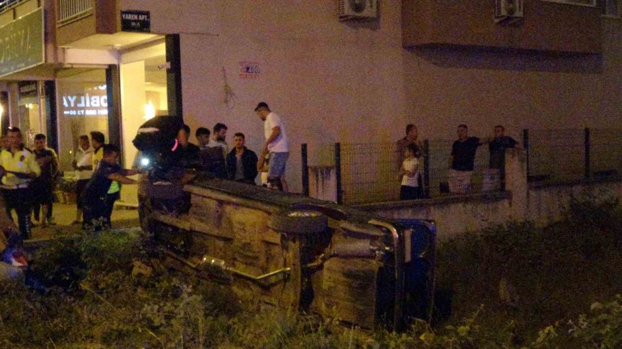 Takla atan araçtan hafif yaralı kurtuldular