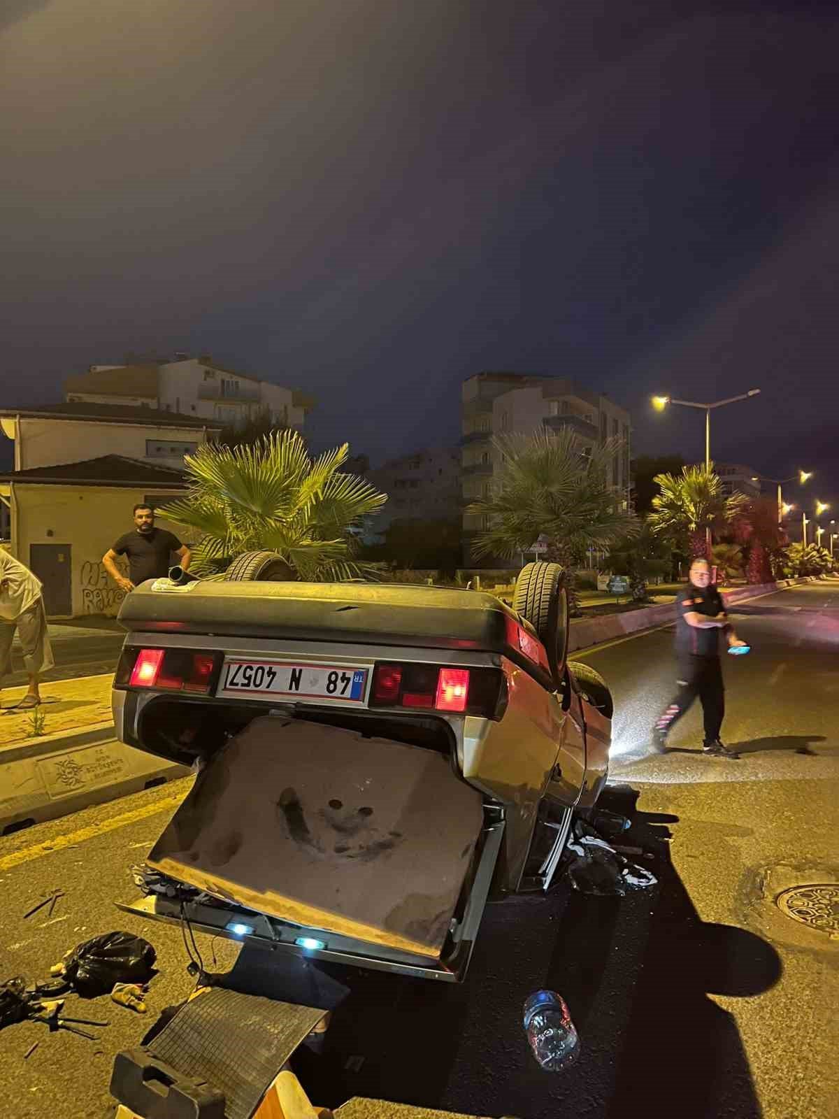 Takla atan araçtan yaralı olarak kurtuldu