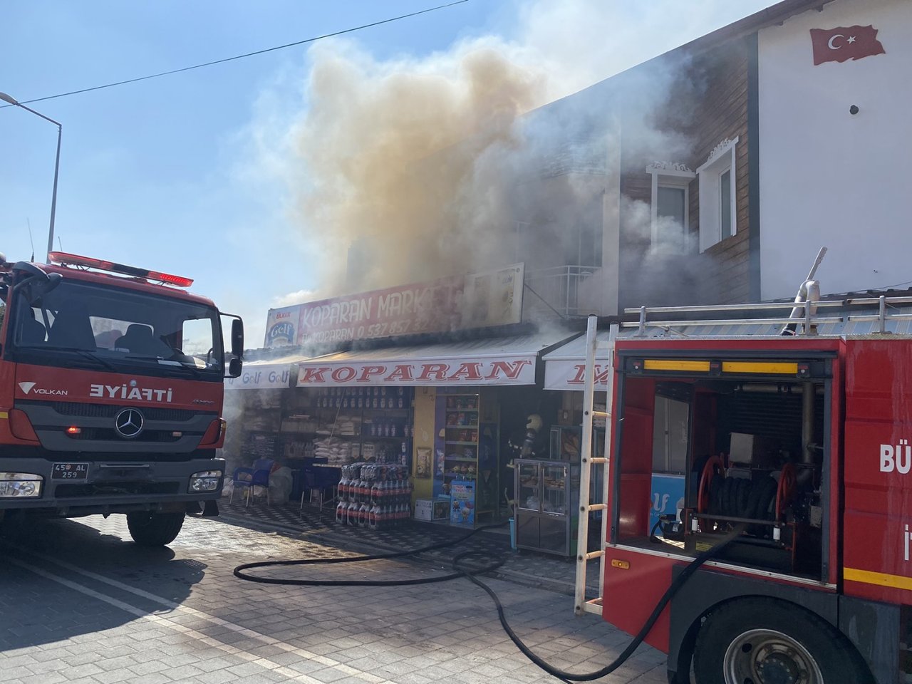 Markette çıkan yangın maddi hasara neden oldu