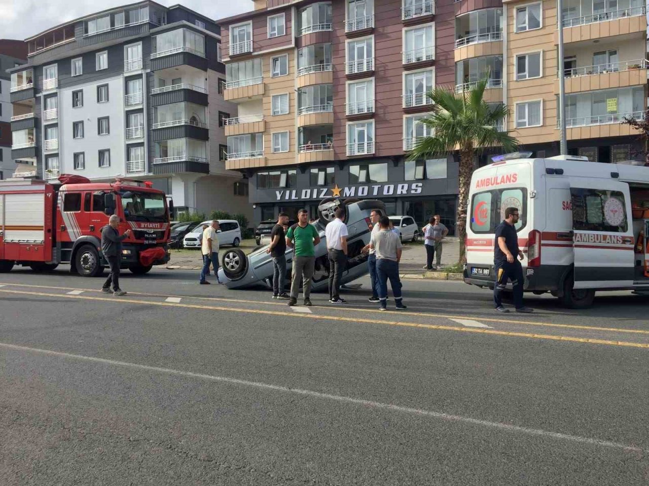 Takla atan araçtan yara almadan kurtuldu