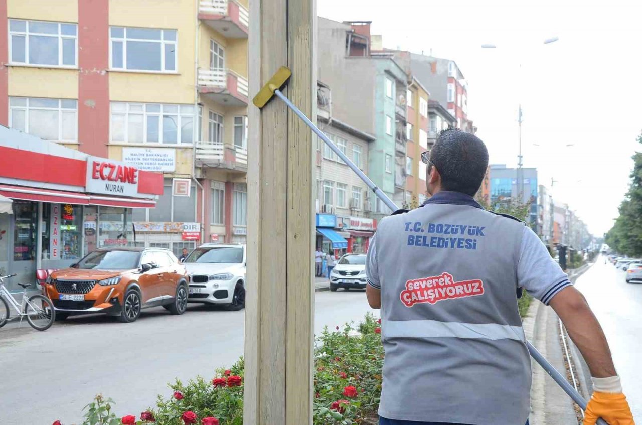 Elektrik direklerine ahşap kaplama