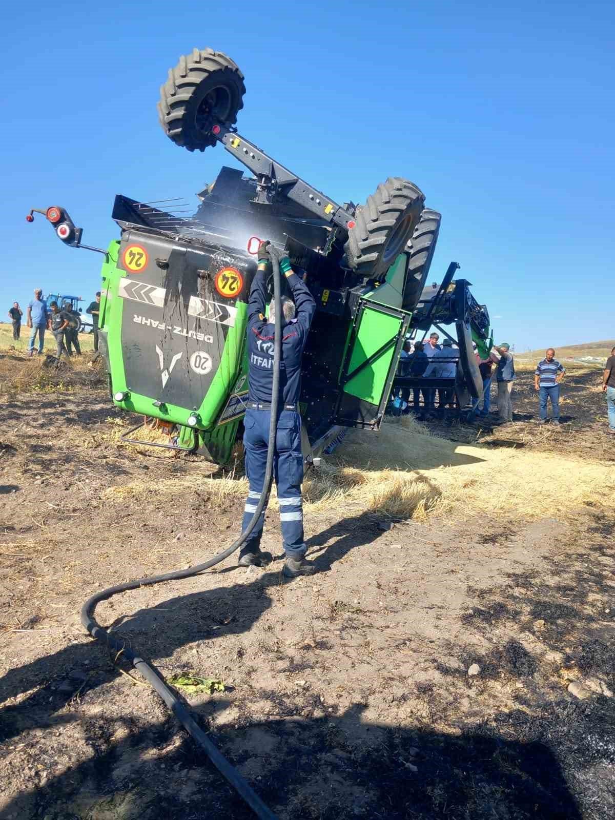 Kars’ta yangın çıkan biçerdöver devrildi