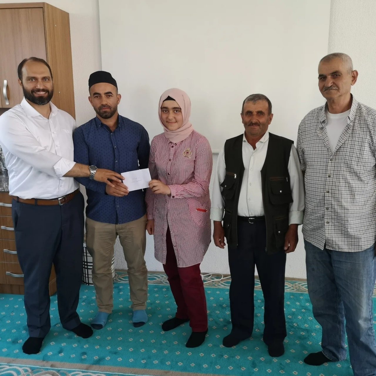 Dereceye giren öğrenciler para ile ödüllendirildi