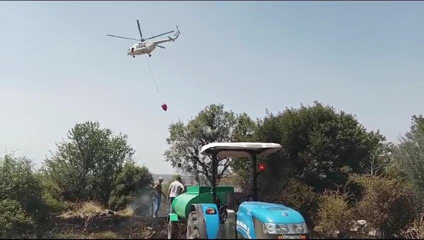 Örtü yangını ormana sıçramadan söndürüldü