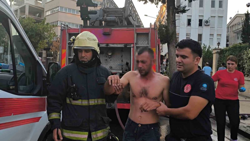 Üzerine döktüğü benzin gözlerinden ediyordu